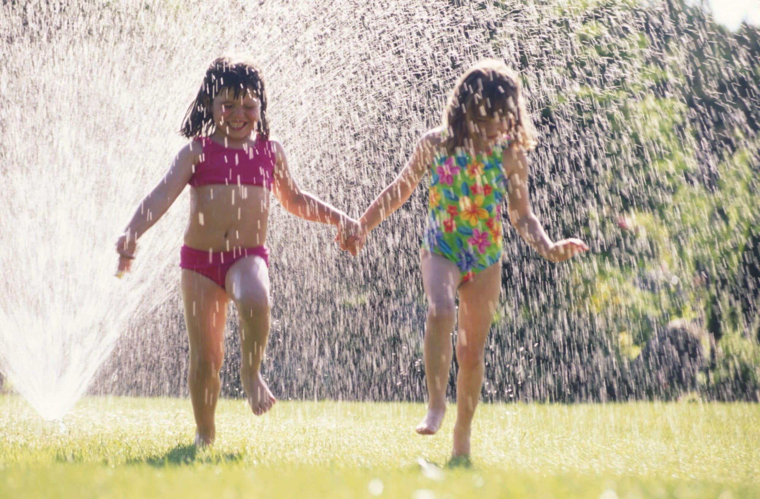 Picture of kids in a sprinkler