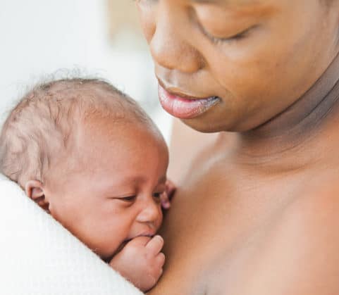 Mother breastfeeding her child