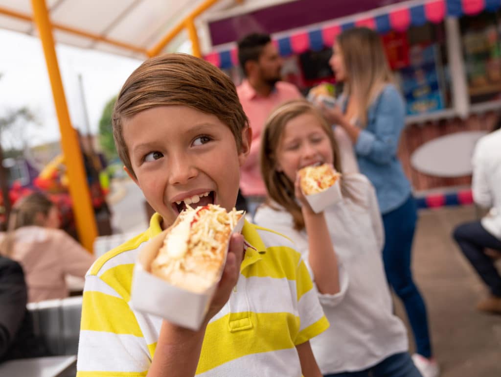 Happy Kids Eating Junk Food At An Amusement Park Chatham Kent Public