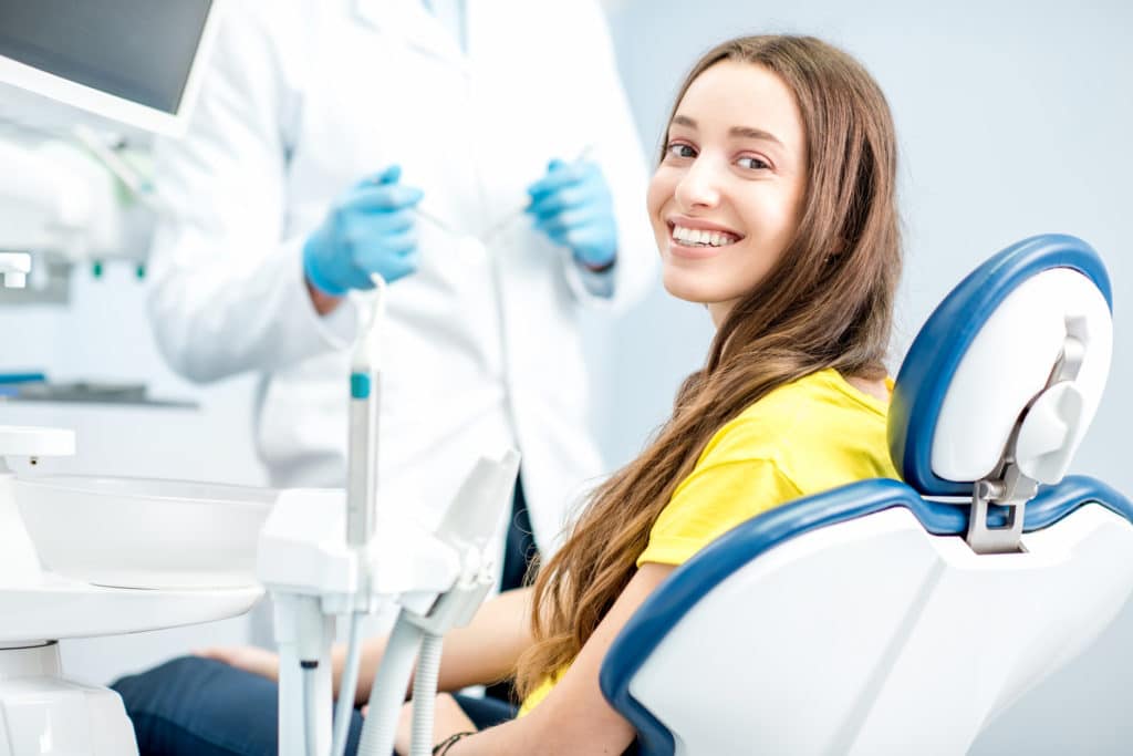 Image of teen in a dental chair