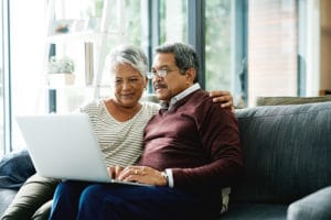 Senior couple researching online